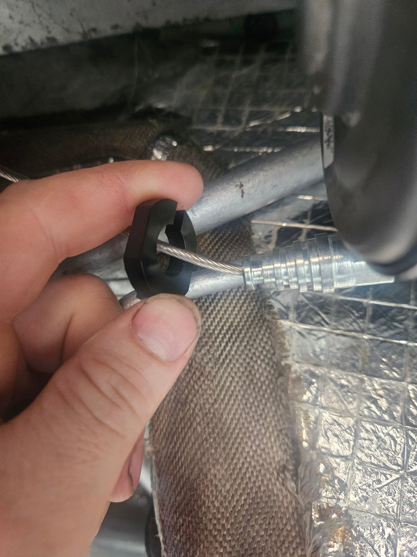 Gen 1 Vanquish Handbrake cable to rear subframe strengthening pieces.| AstonSpares - Aston Spares