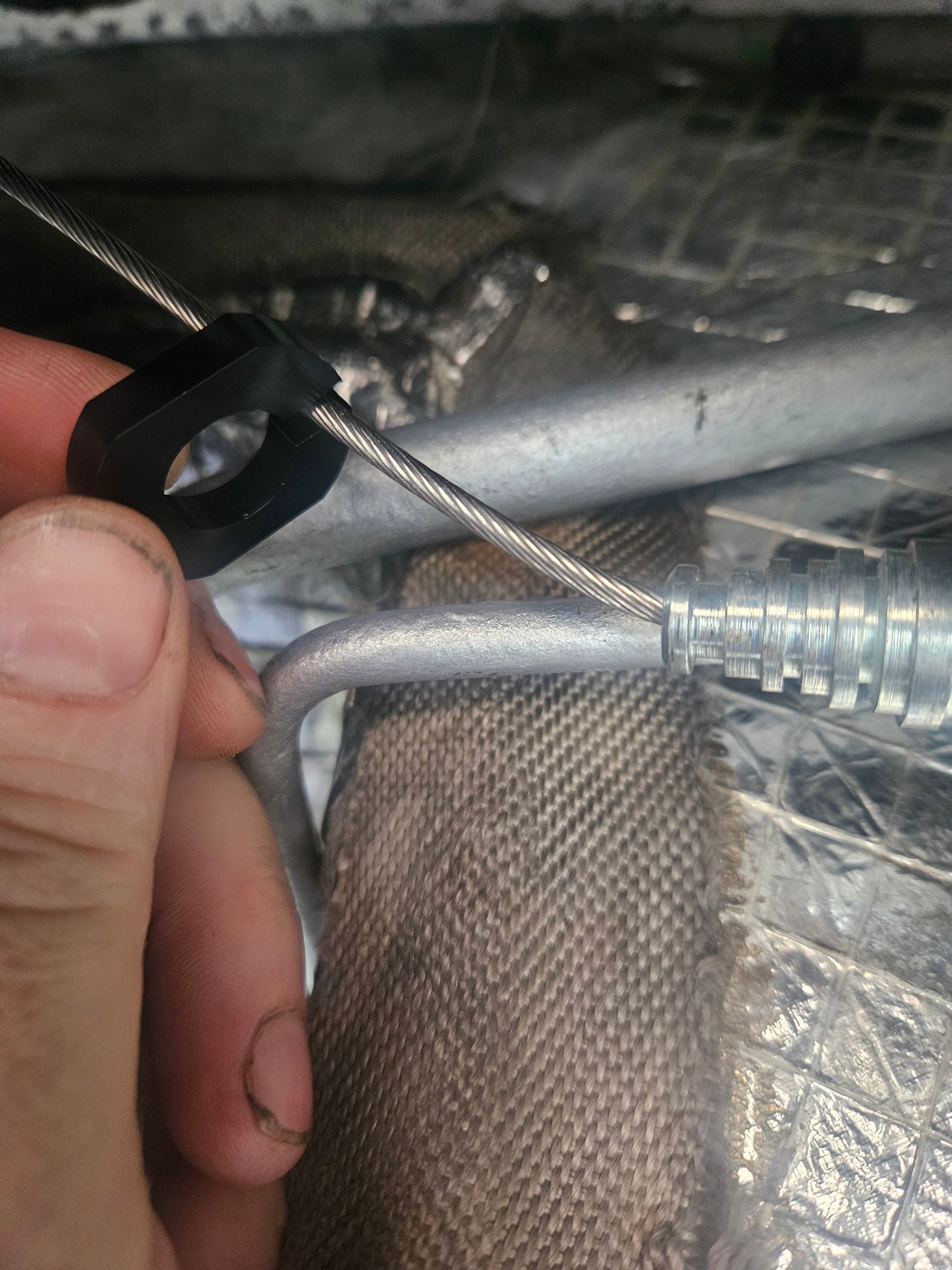 Gen 1 Vanquish Handbrake cable to rear subframe strengthening pieces.| AstonSpares - Aston Spares