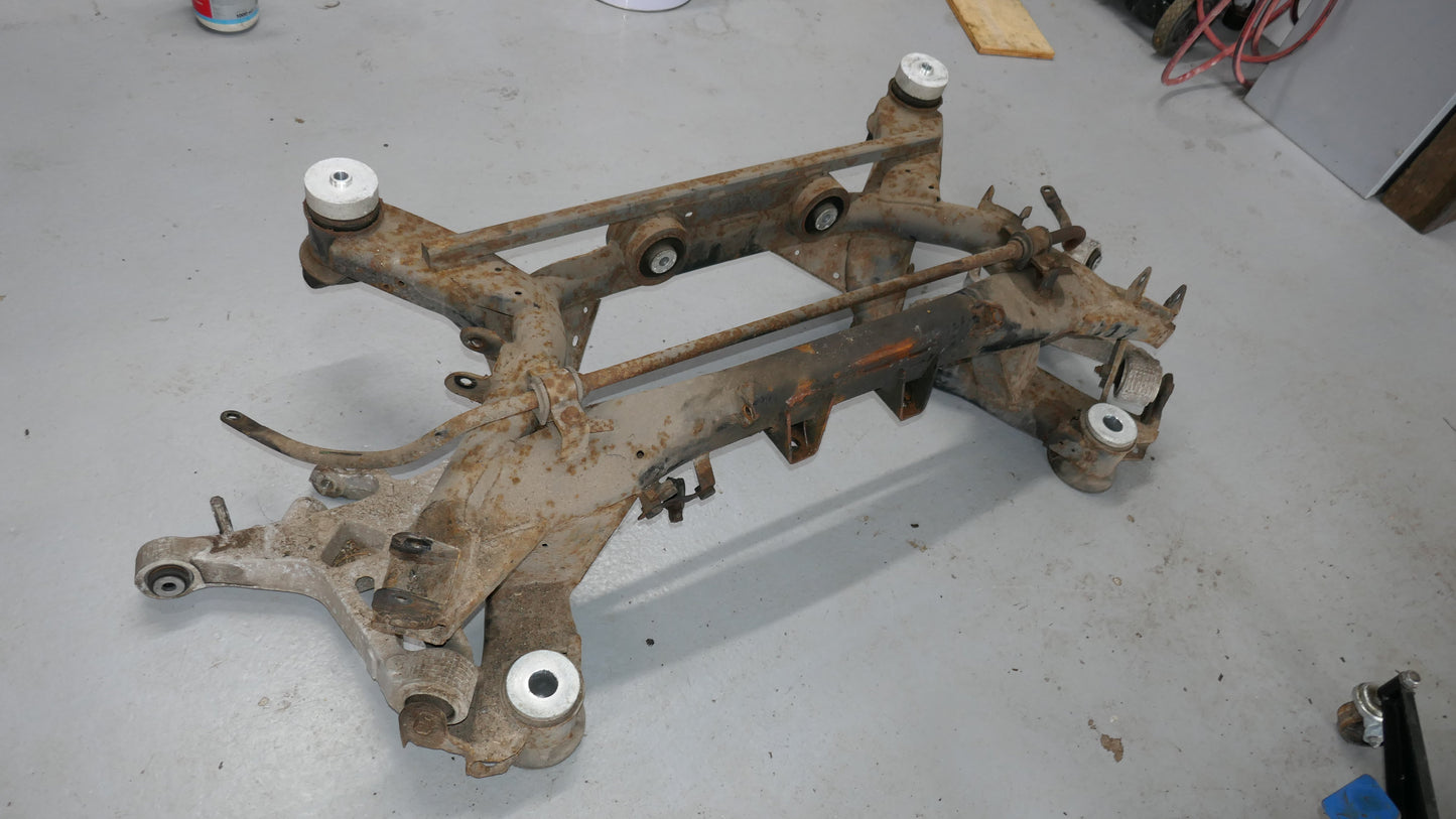 Gen 1 Vanquish Subframe refurbishing service. - Aston Spares